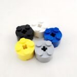 2x2 Brick Round with Axle Hole - Goldwin Bricks
